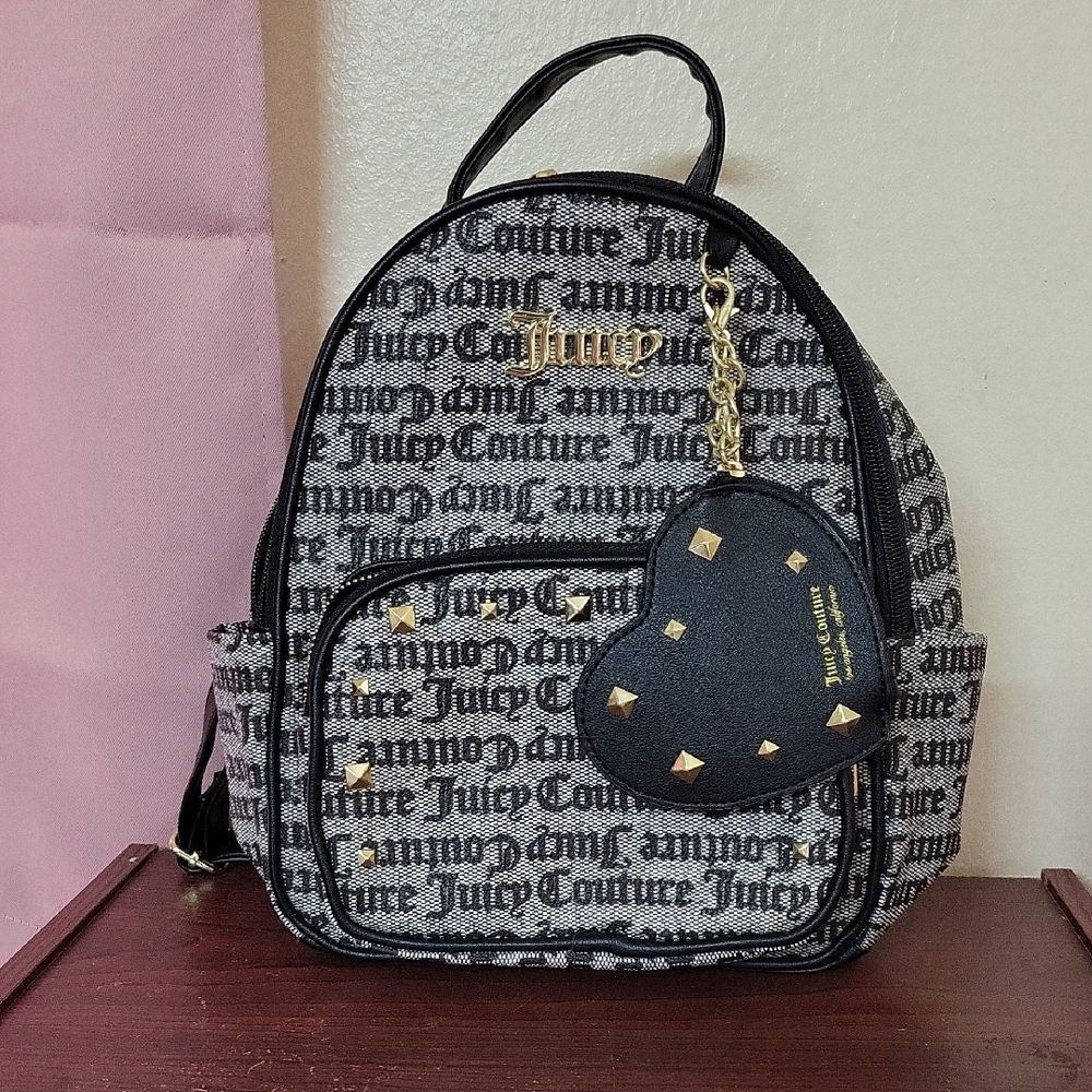 Juicy Couture Black and Gold Backpack with Chic Design
